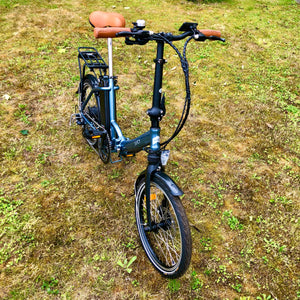 Pre-owned Juicy Compact Plus 20 folding electric bike ridden less than 10 miles